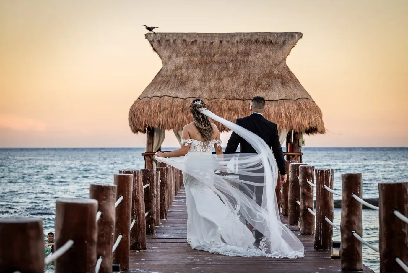 Wedding ceremony at a hotel with a bride and groom kissing The Fives Corpo.