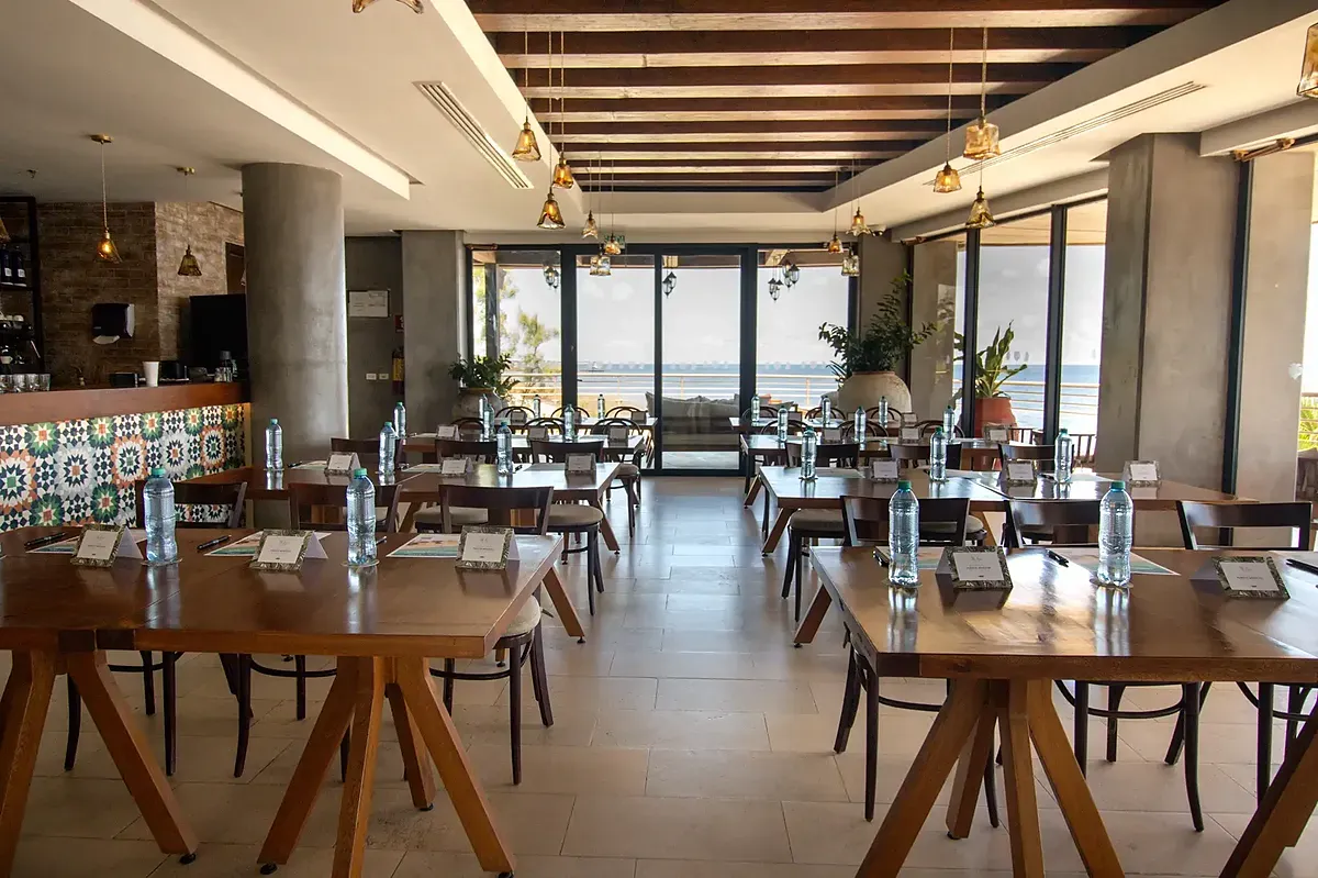 Al Mare oceanfront fine dining restaurant at The Fives Oceanfront Riviera Maya featuring elevated cuisine and romantic ambience in Playa del Carmen