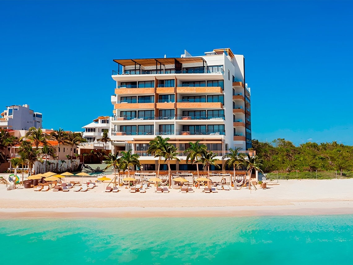 Hotel The Fives Oceanfront Riviera Maya: suites de lujo frente al mar con todo incluido opcional, México. Web oficial.