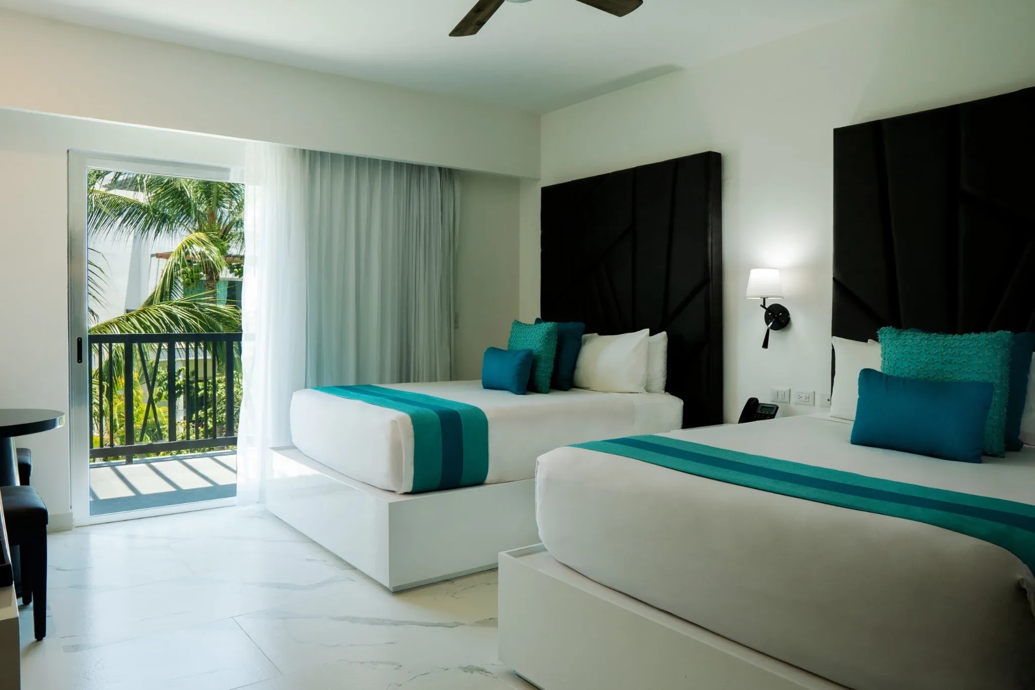 Residence-style family suite with multiple bedrooms at The Fives Beach