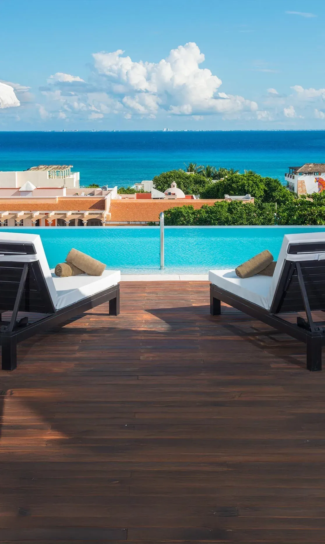 Infinity pool overlooking the ocean at The Fives Downtown Hotel - Curio Collection by Hilton.