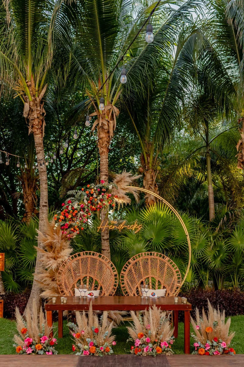 Outdoor wedding reception with tropical garden atmosphere