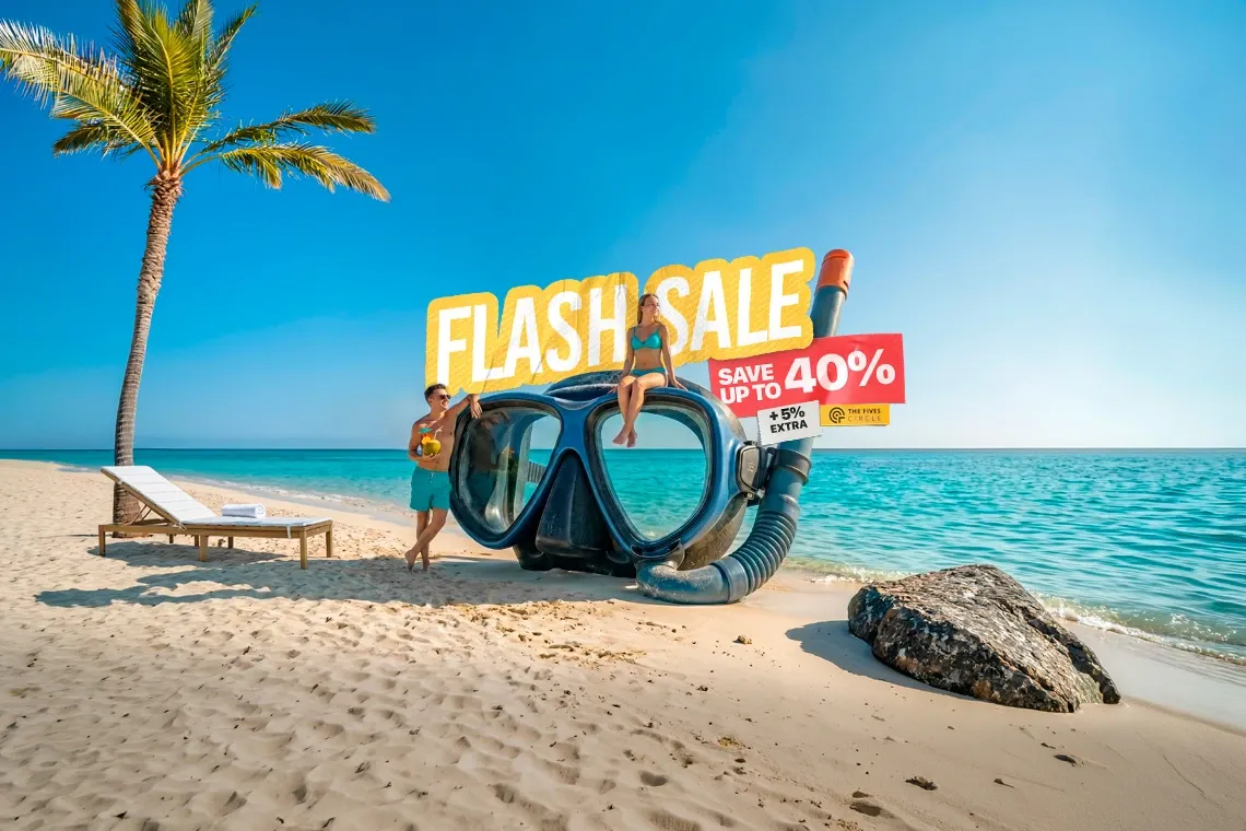 Beach flash sale The Fives Oceanfront | Luxury Hotel in Puerto Morelos | Official with couple, diving mask, and palm tree.
