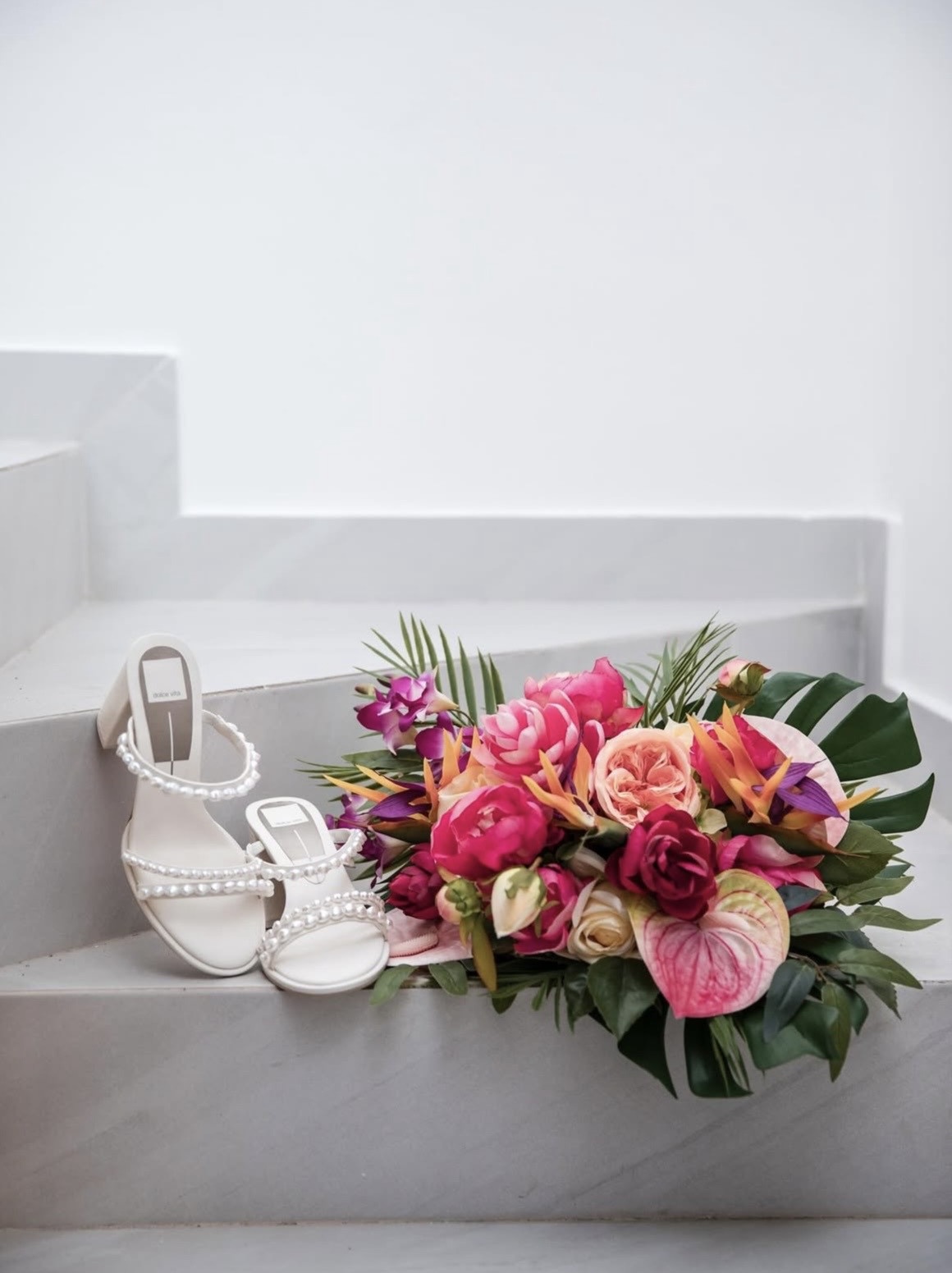 Oceanfront wedding reception setup with elegant decor