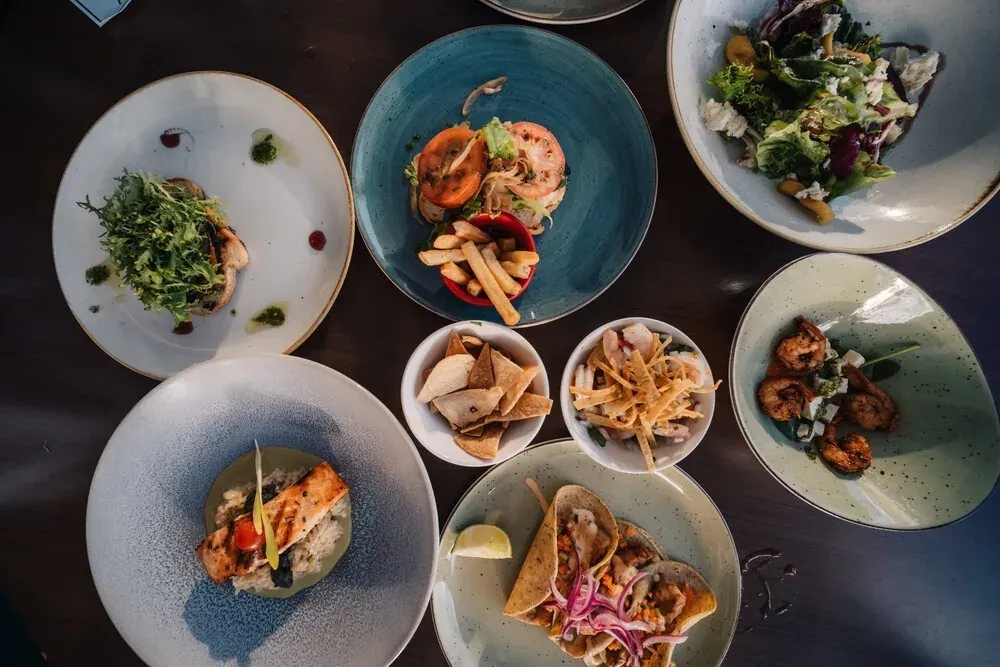 Gastronomy: Savor fresh seafood tacos and grilled salmon, part of your Mexican Caribbean vacation.