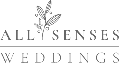 a black and white logo for all senses weddings