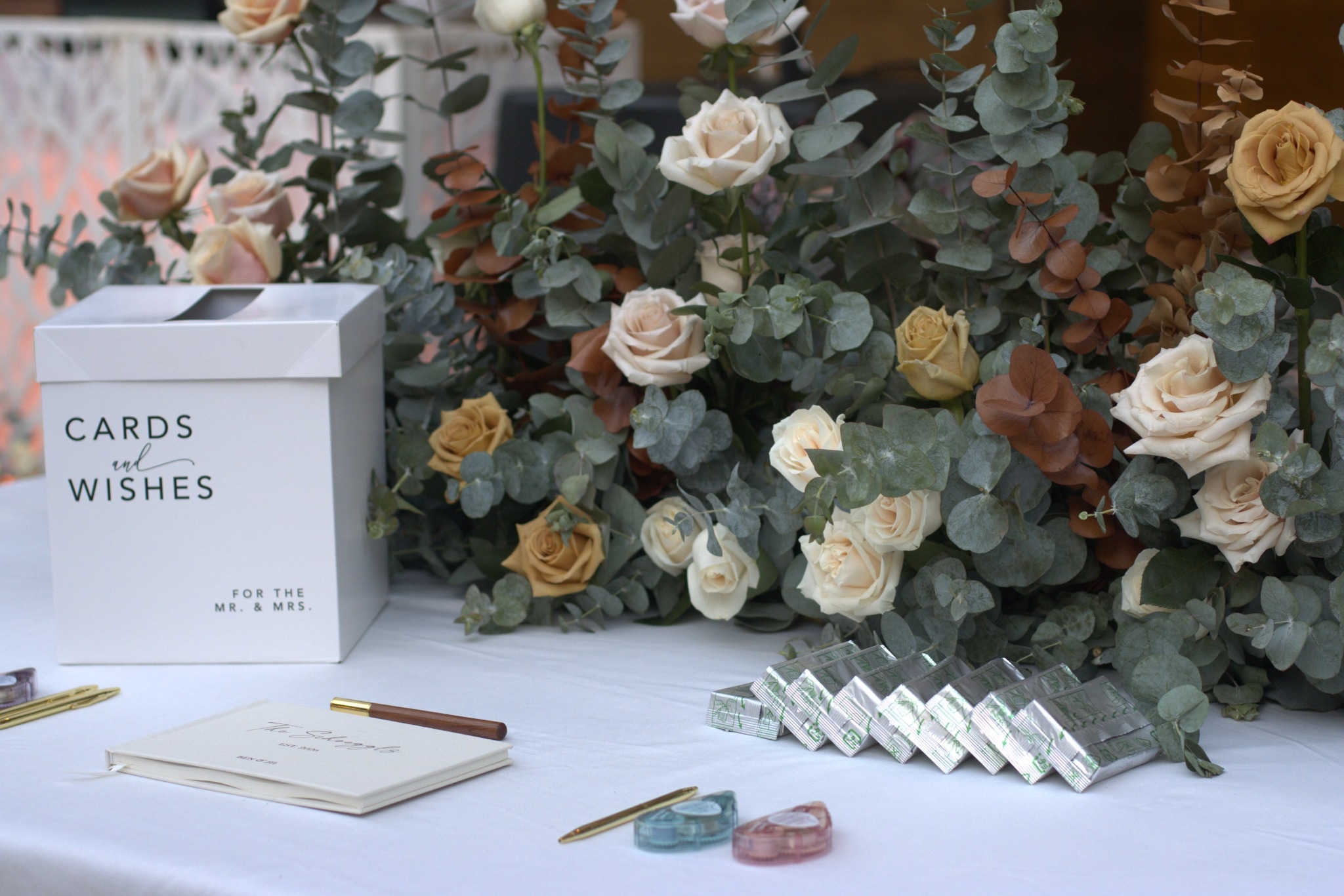 Outdoor garden ceremony setup with elegant floral details