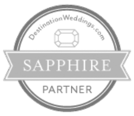 the logo for destination weddings.com is a sapphire partner .