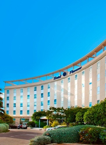 a large building with the word hotel on it