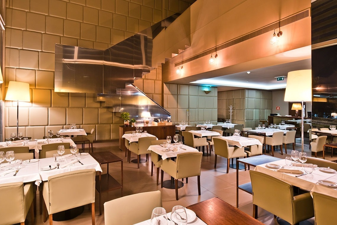 Elegant dining room at Golden Tulip Sao Joao da Madeira. Book direct on our official website.