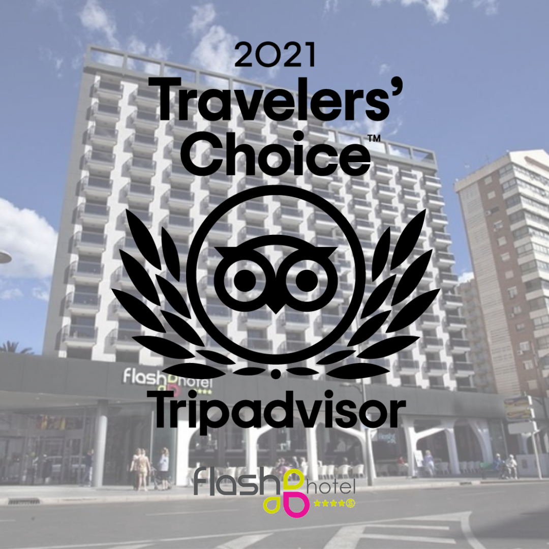 a travelers choice tripadvisor logo with a building in the background