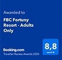 a blue sign that says `` awarded to fbc fortune resort adults only '' on it .