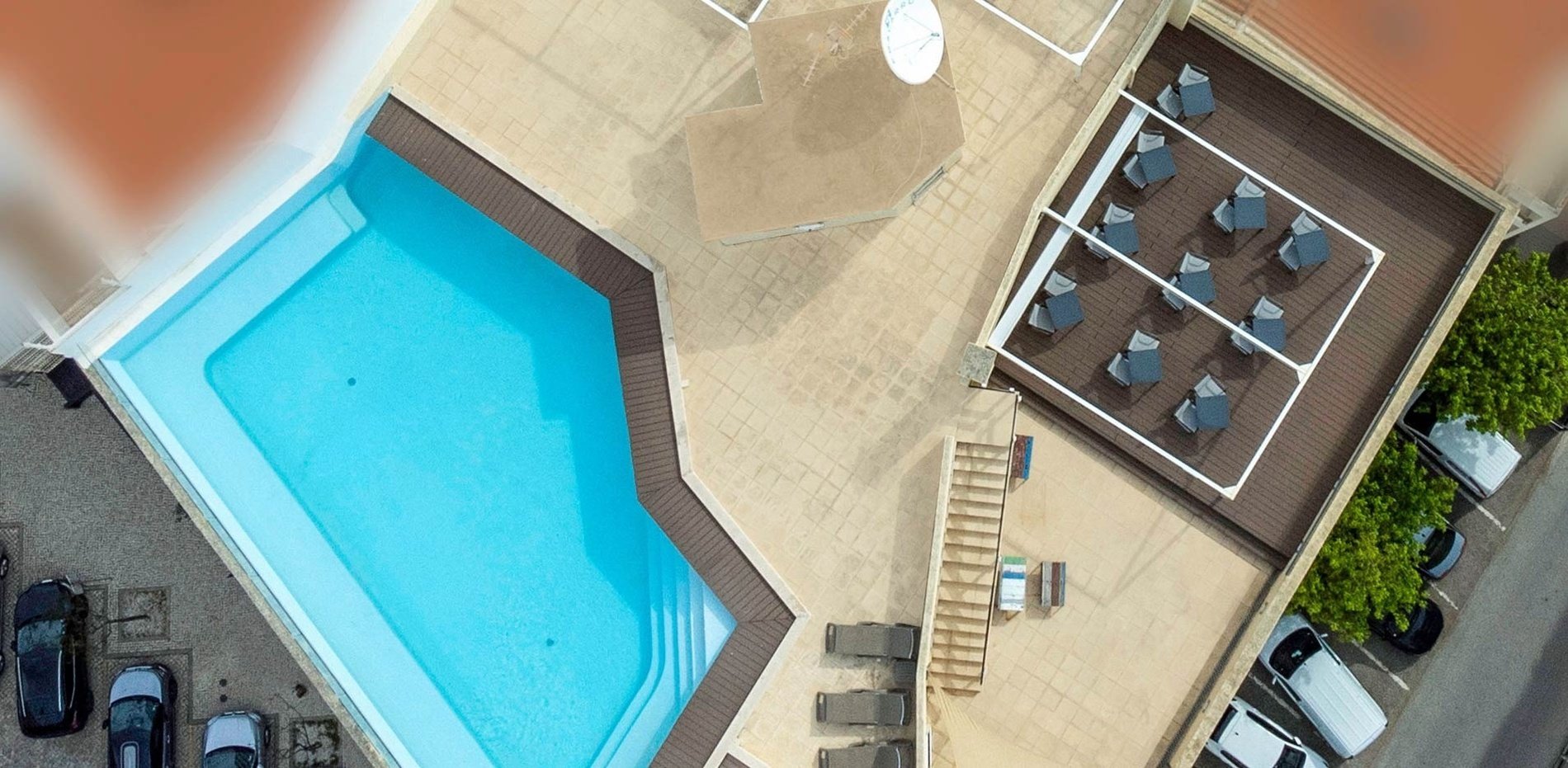 a swimming pool with a life preserver on the wall