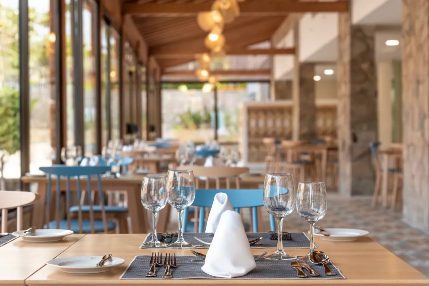 a restaurant with a lot of tables and chairs