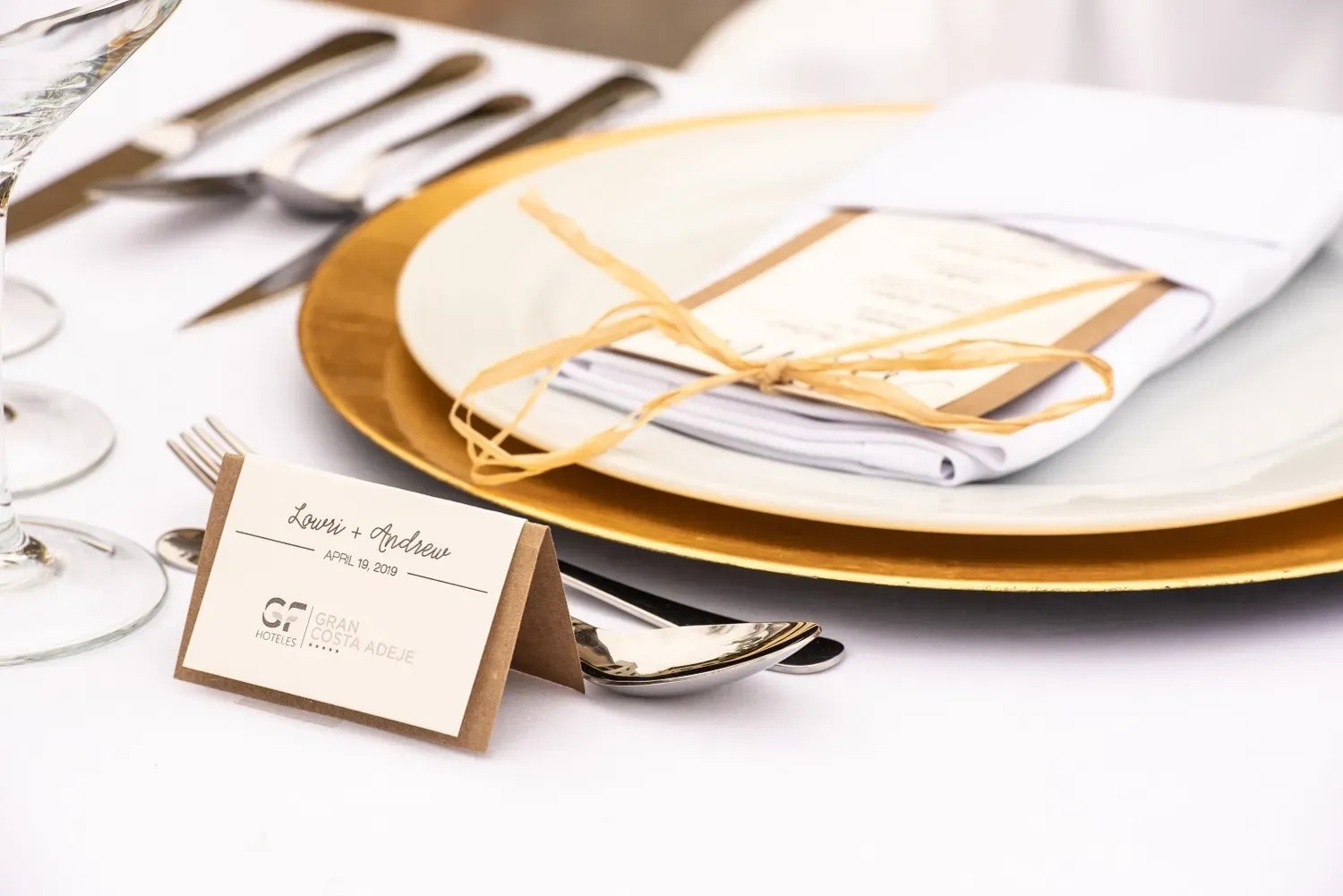 a man stands on a rocky beach near the ocean