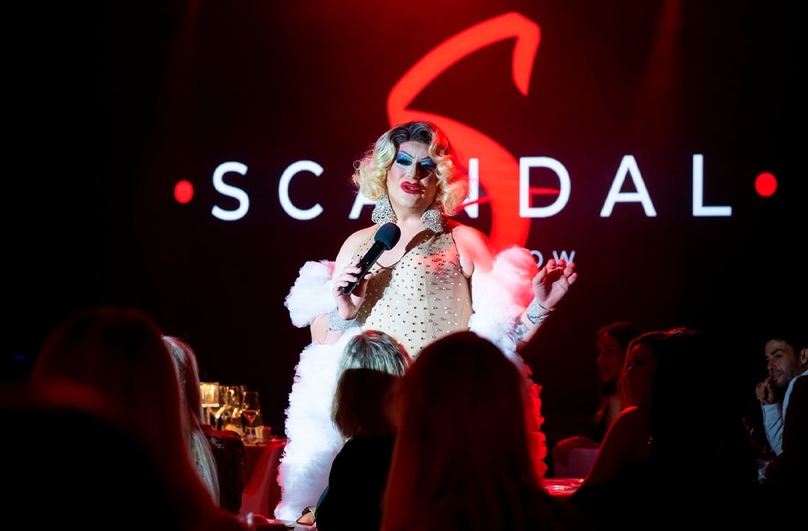 a group of people holding checks that say green stay