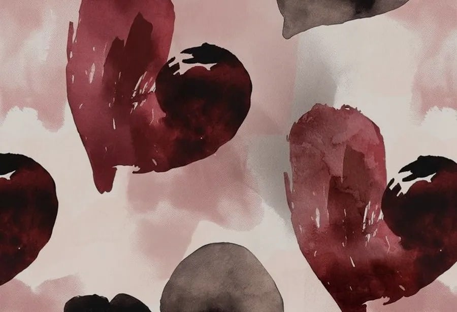 un patrón de corazones rojos y negros sobre un fondo rosa