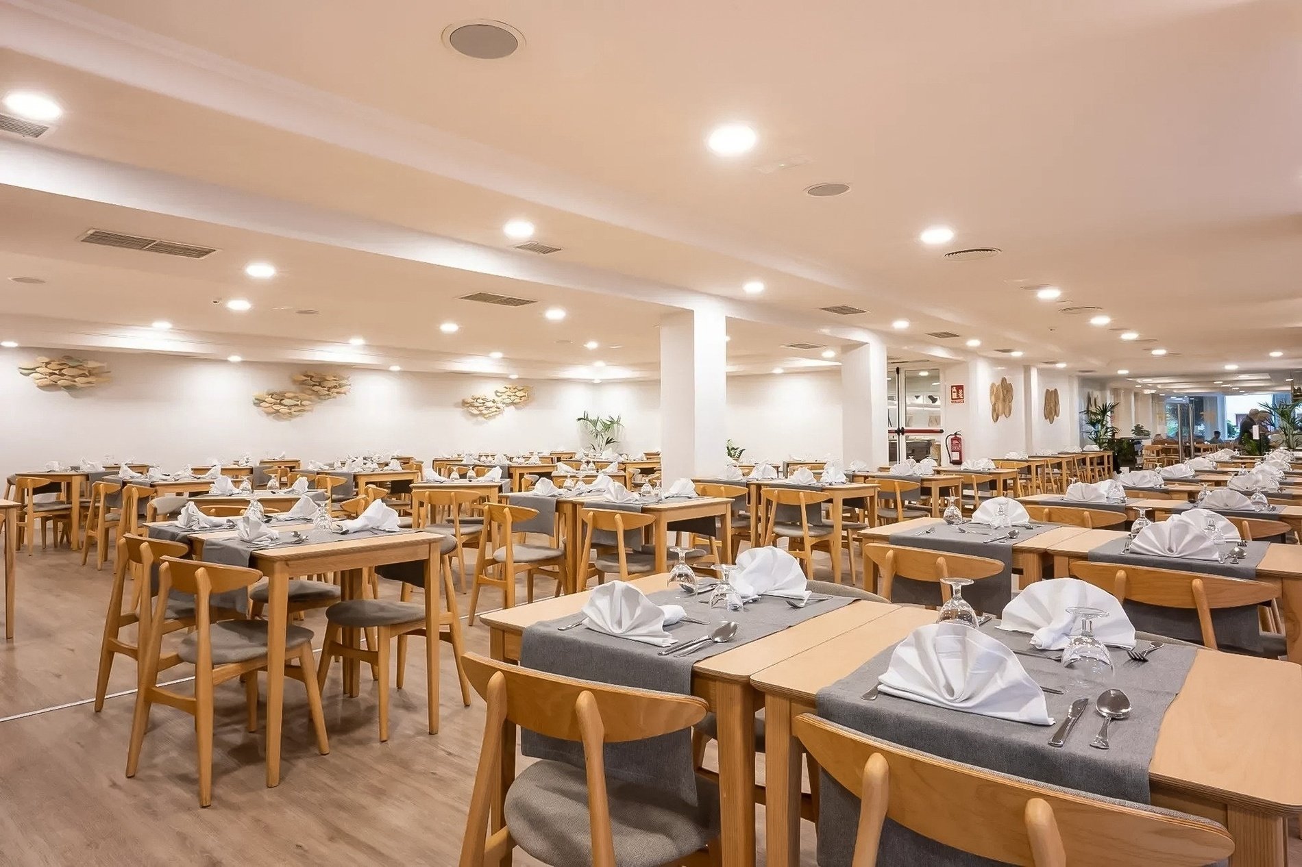 a buffet line in a restaurant with plates on it