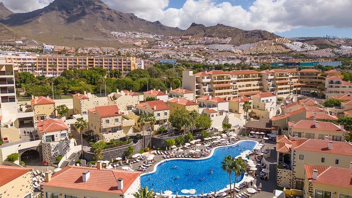 a buffet line in a restaurant with plates on it
