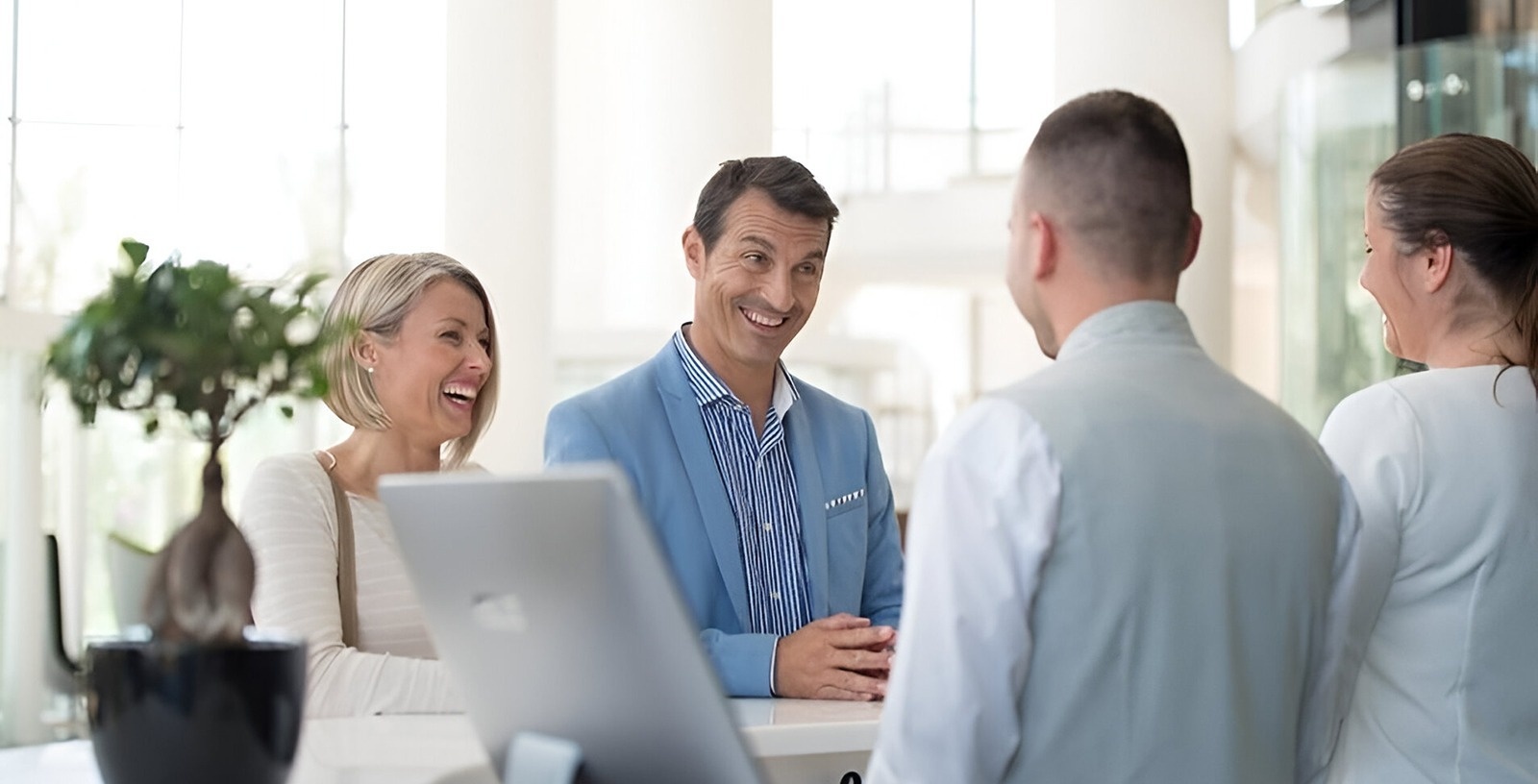 a group of women are dancing and one is holding a glass of champagne