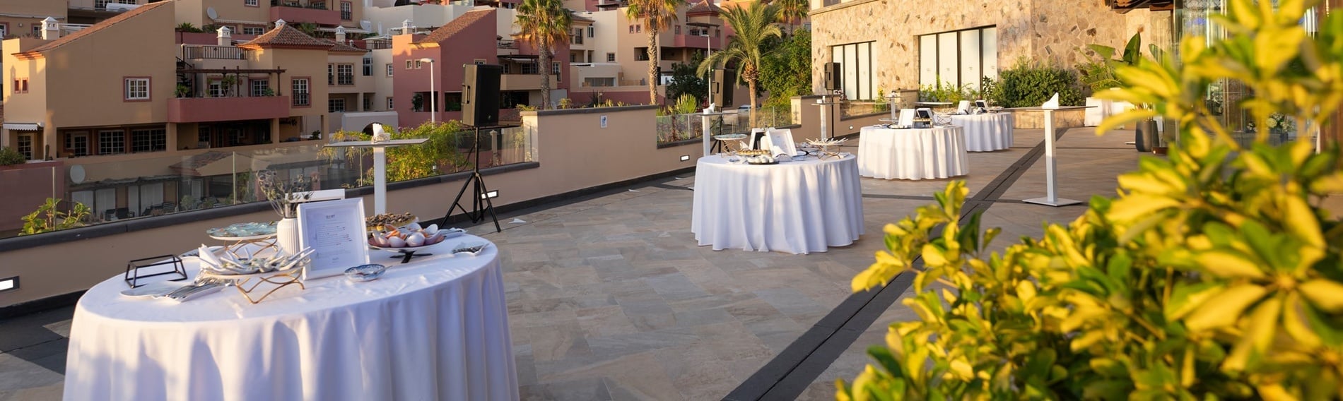 a man and a woman are walking on the beach