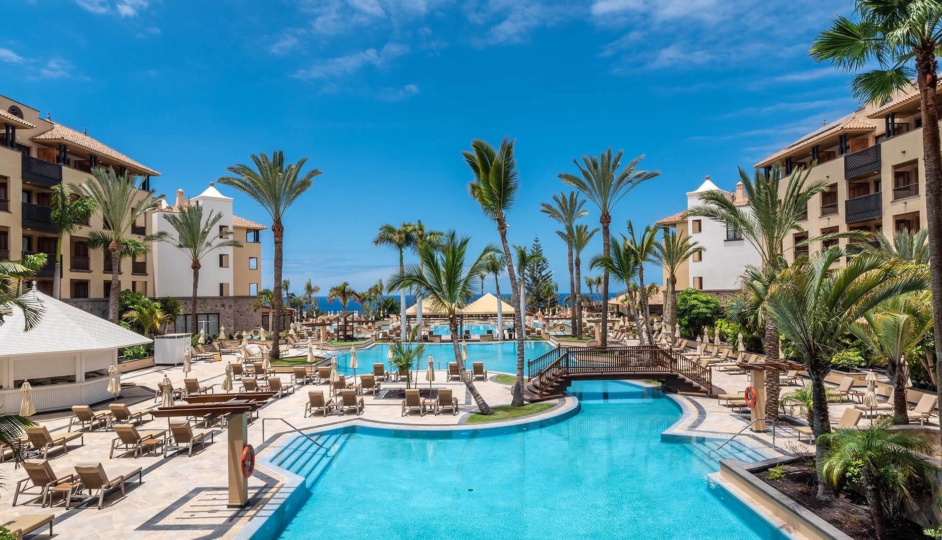 two people shaking hands over a table with a graph on it