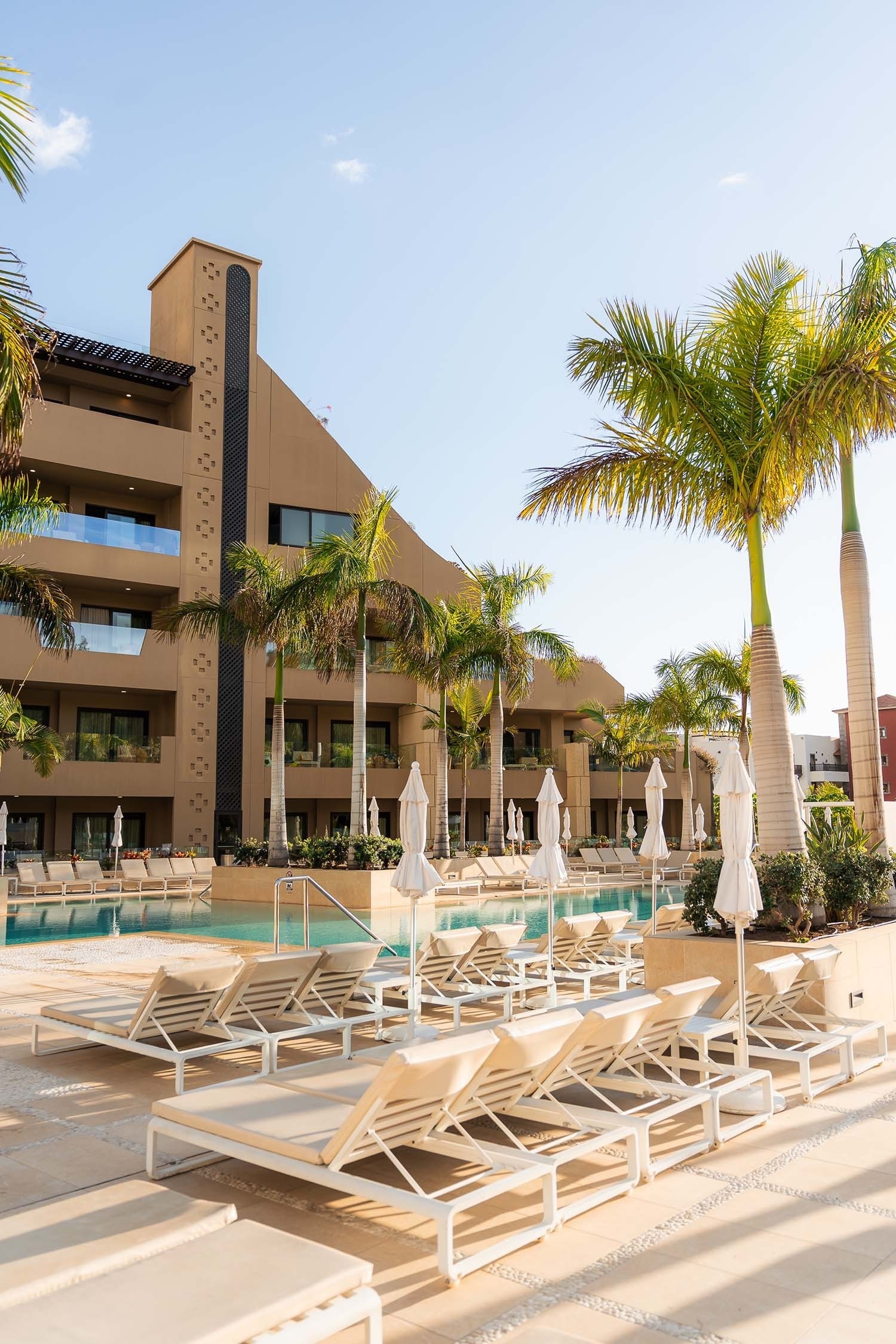 a swimming pool with stairs leading up to it