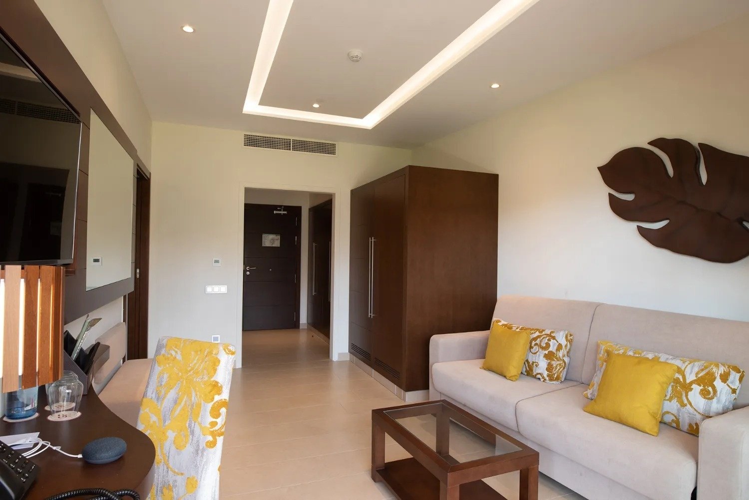 a living room with a couch and a table