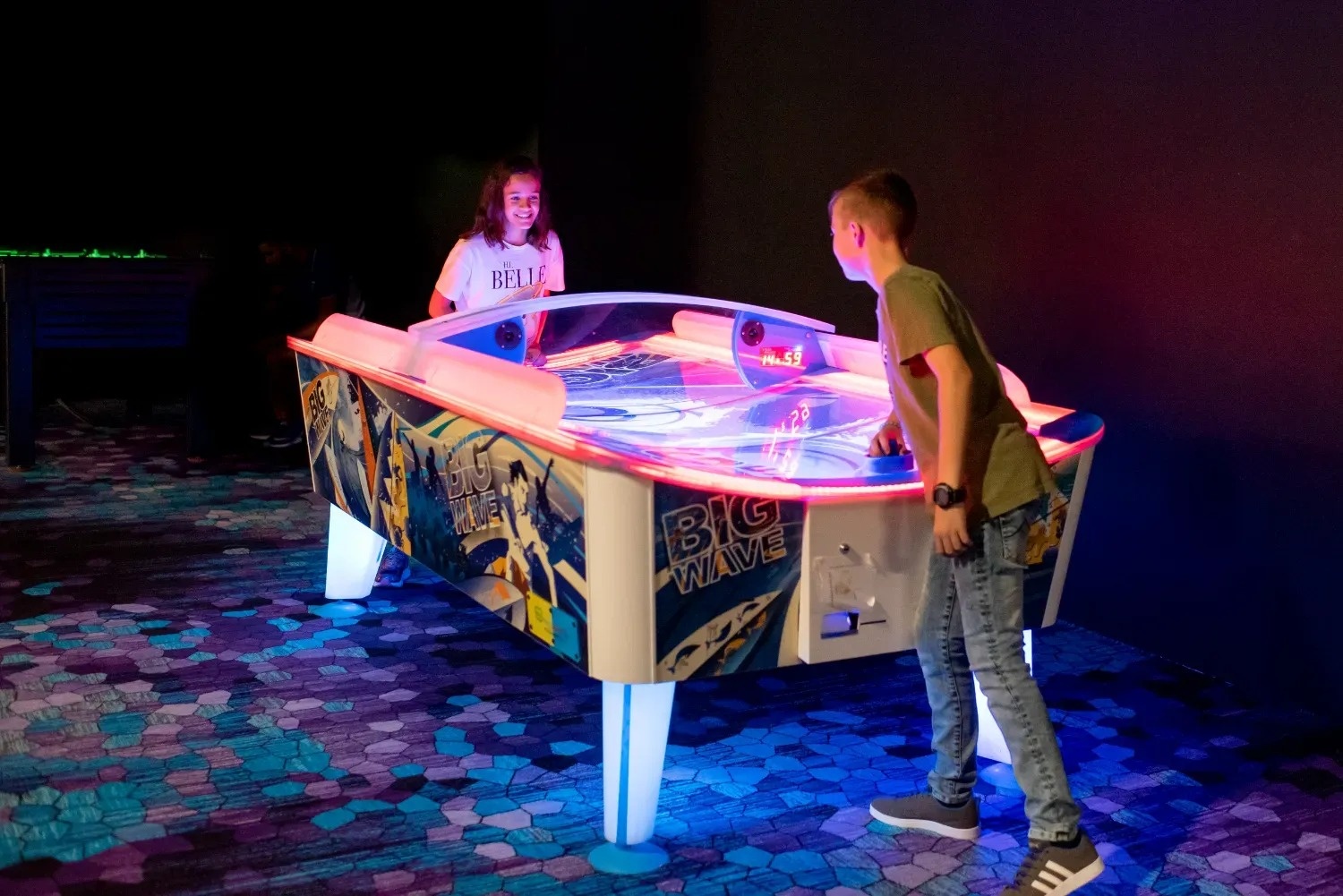 a large room with lots of colorful toys and fences