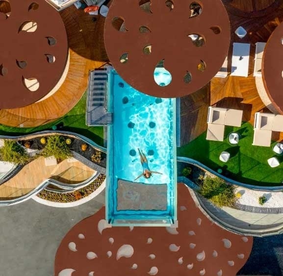 an aerial view of a sandy island in the middle of the ocean