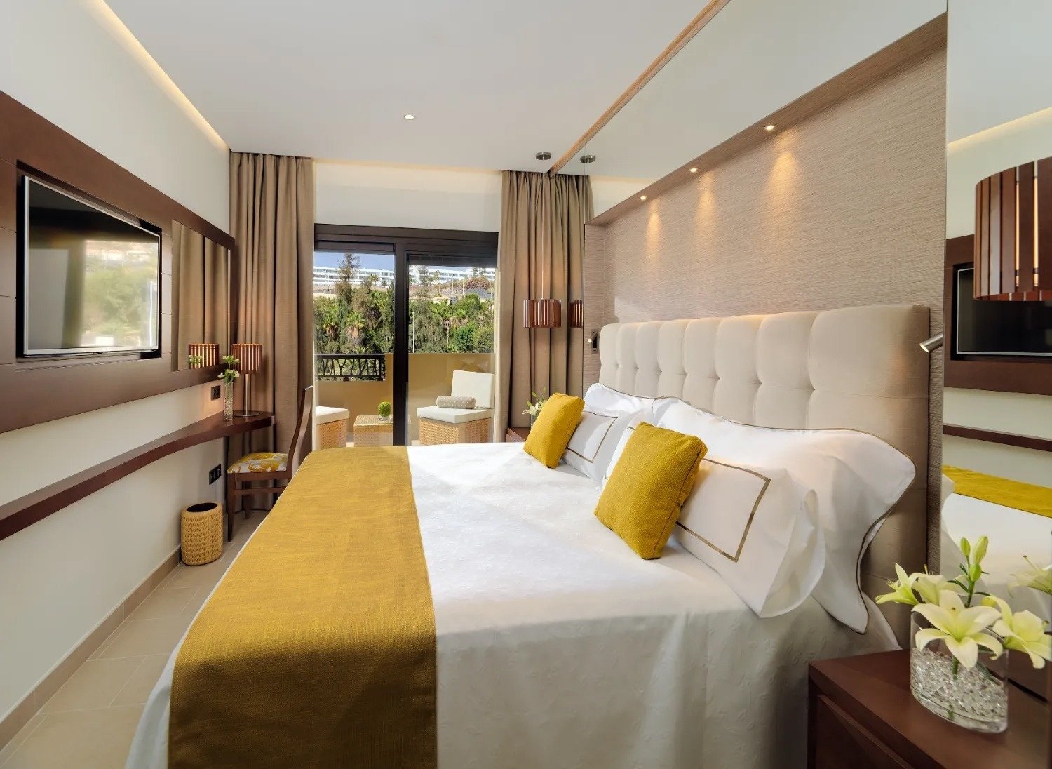 a green heart shaped leaf on a sandy beach