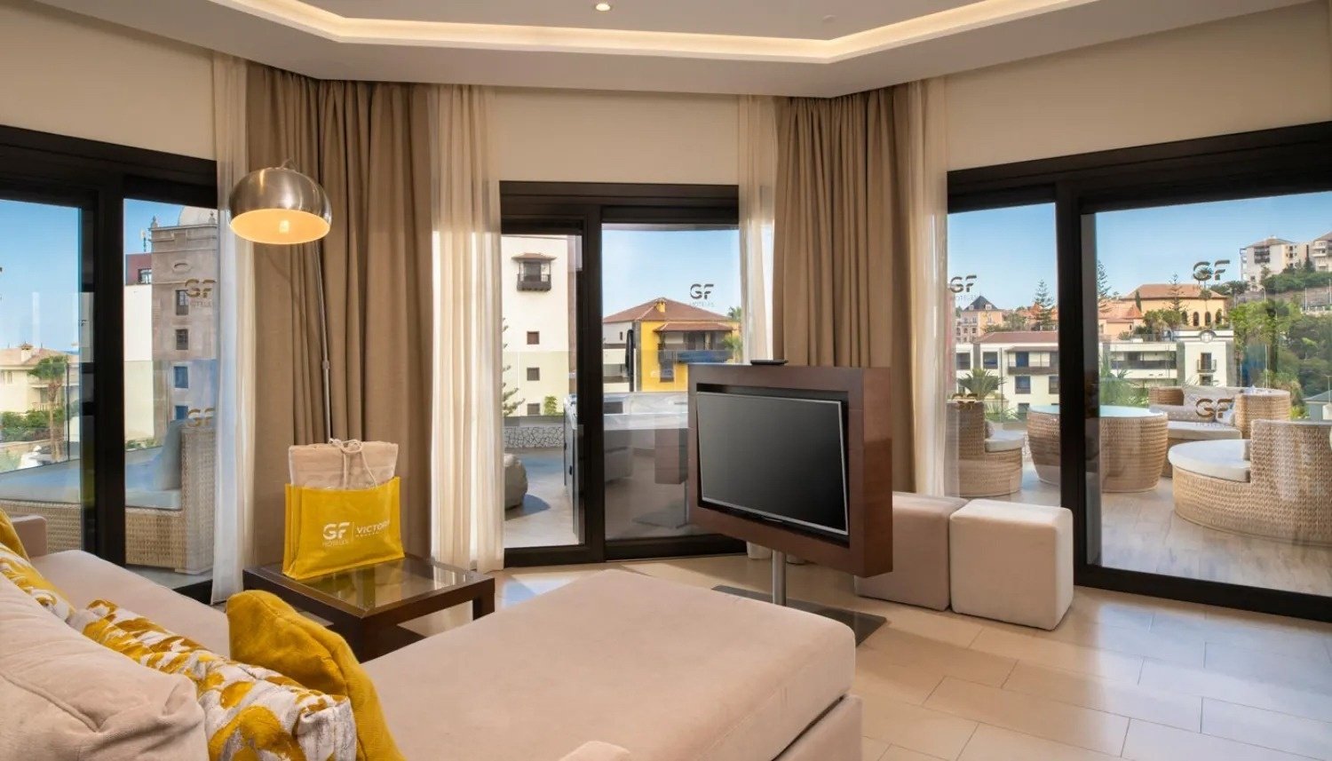 a living room with a yellow bag that says gf on it