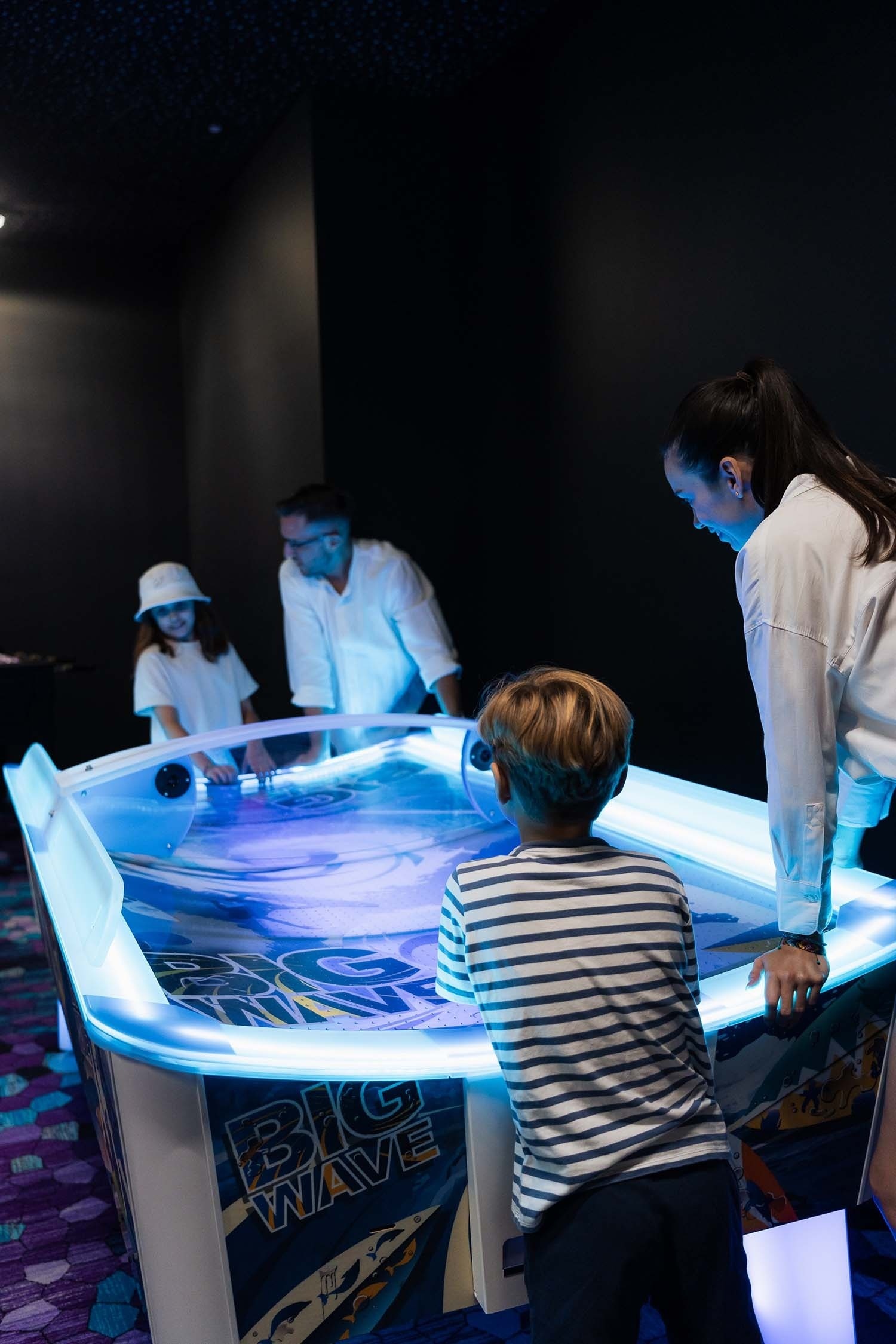 a group of people are playing a game called big wave