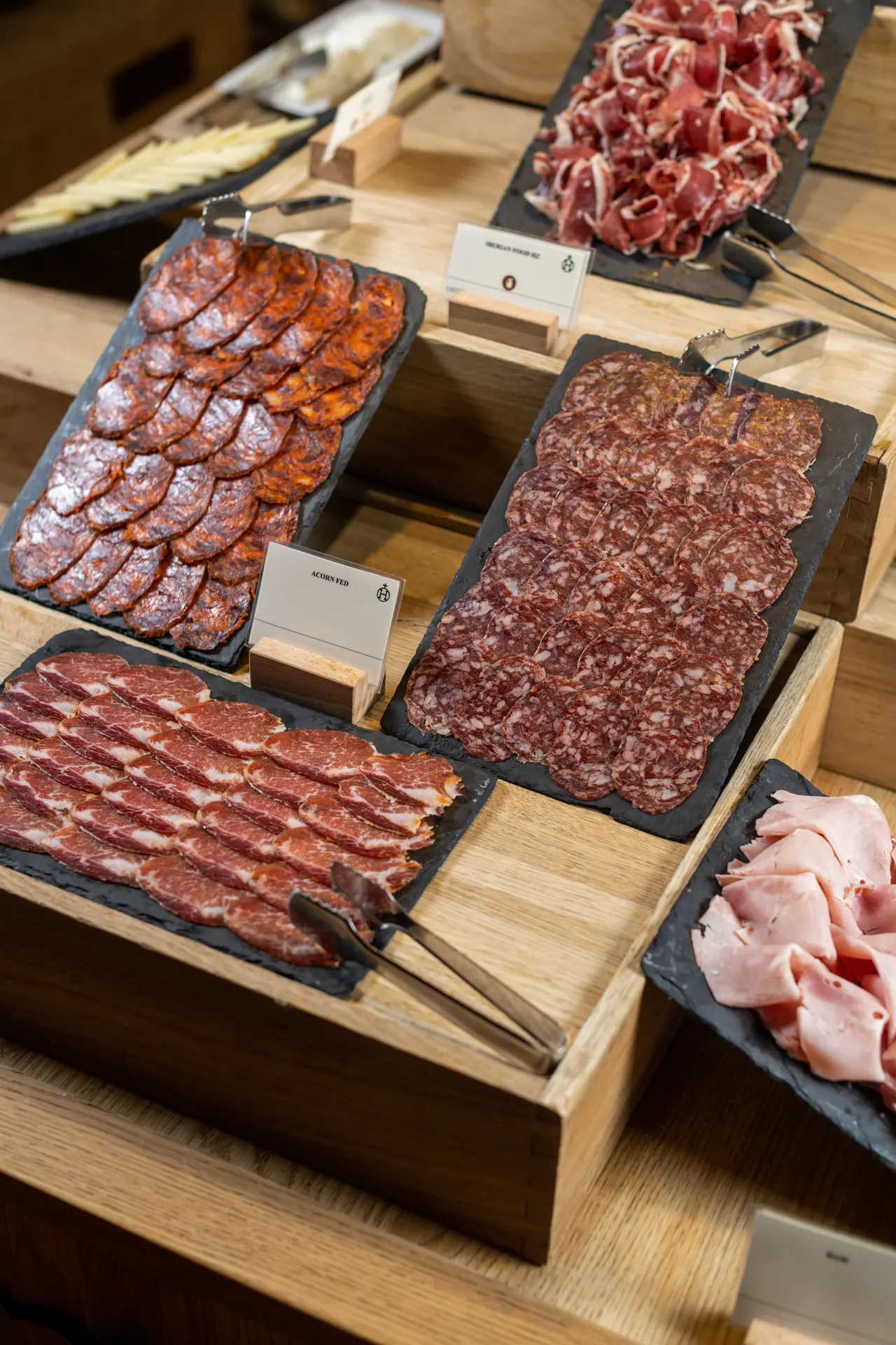 Gourmet cured meats and cheeses from our Hacienda Zorita Wine Hotel buffet, perfect for a light meal or snack.
