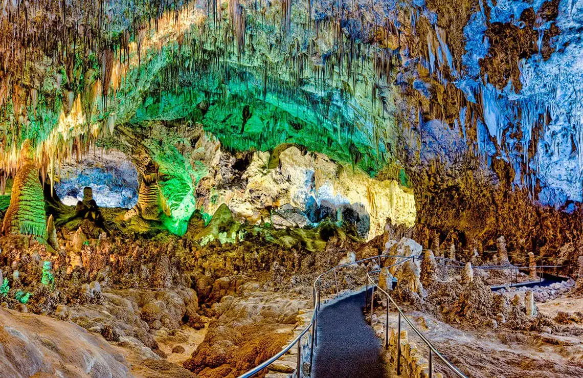 Enchanting cave formations with colorful lighting, perfect for Dorobe adventures.