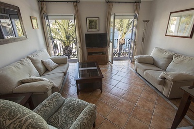 a living room with two couches and a television