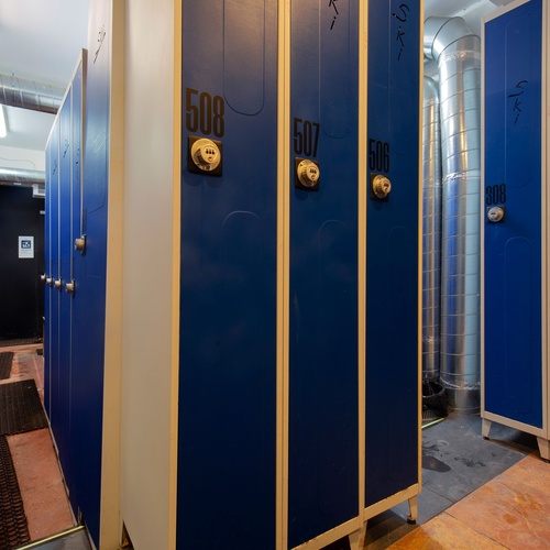 a row of blue lockers with the numbers 508 507 and 306 on them