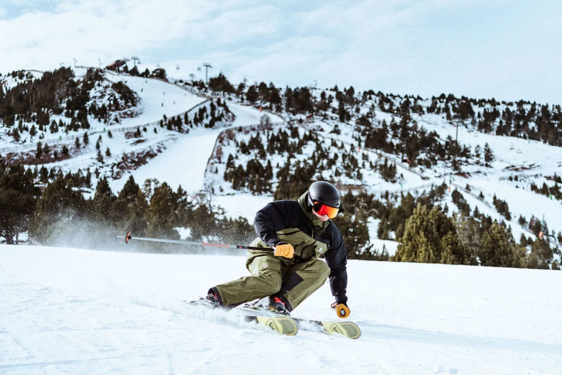 Professional skier NEXTA: Corporate enjoying snowy slopes.
