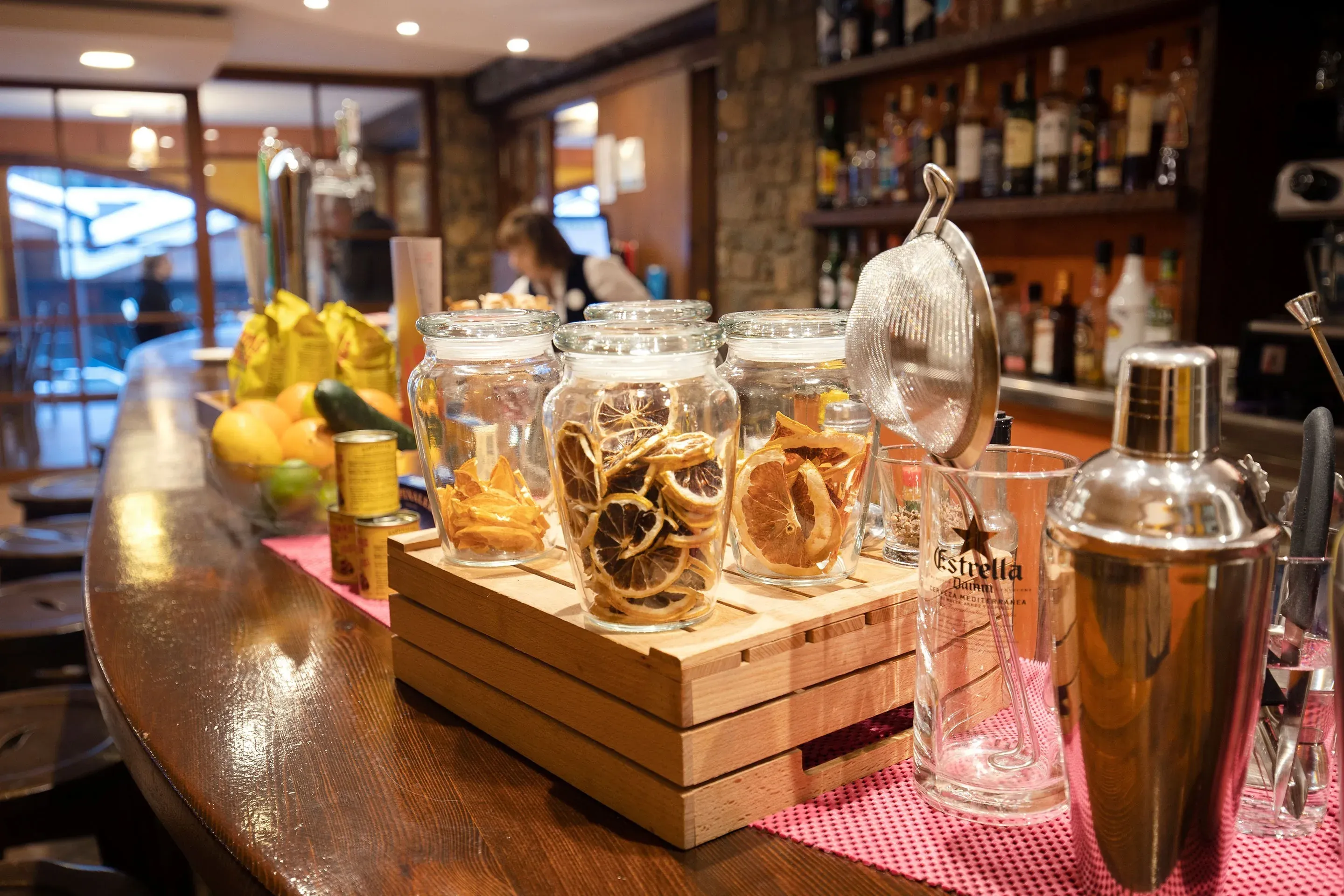 NEXTA Corporate hotel bar: featuring cocktails, fruit, and decor.