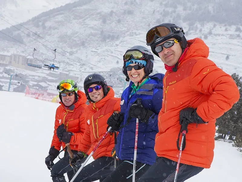 Skiing group at NEXTA: Corporativa. Happy ski team on the mountain.