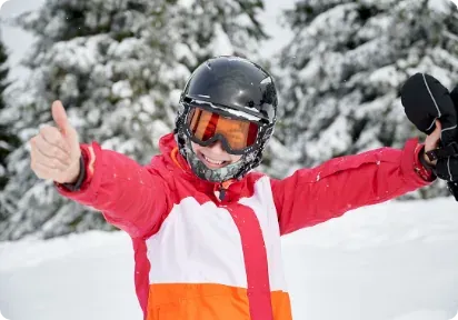 Vacances NEXTA: Corporatives à la neige avec pouce levé