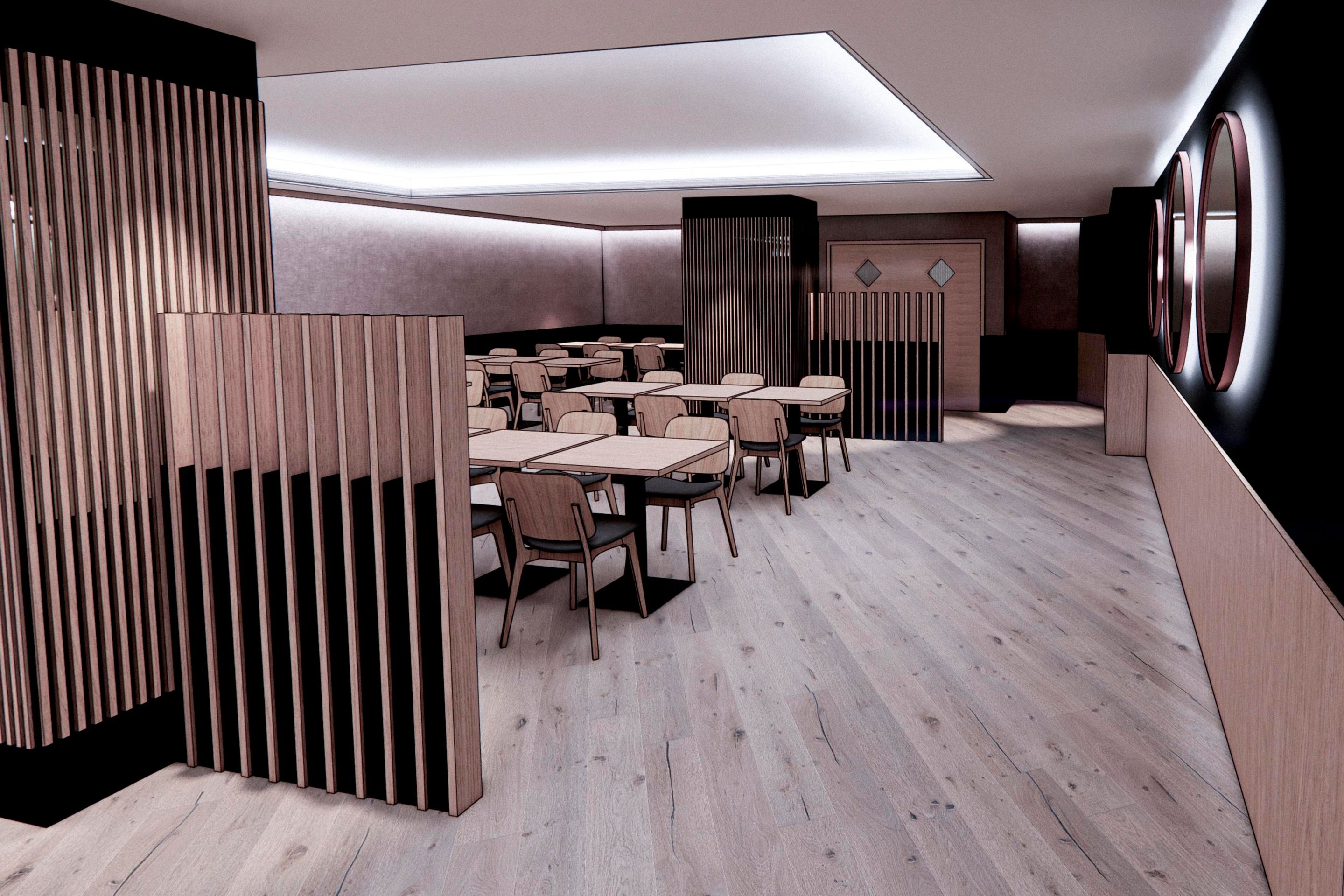 un restaurante con mesas y sillas y una pared de madera