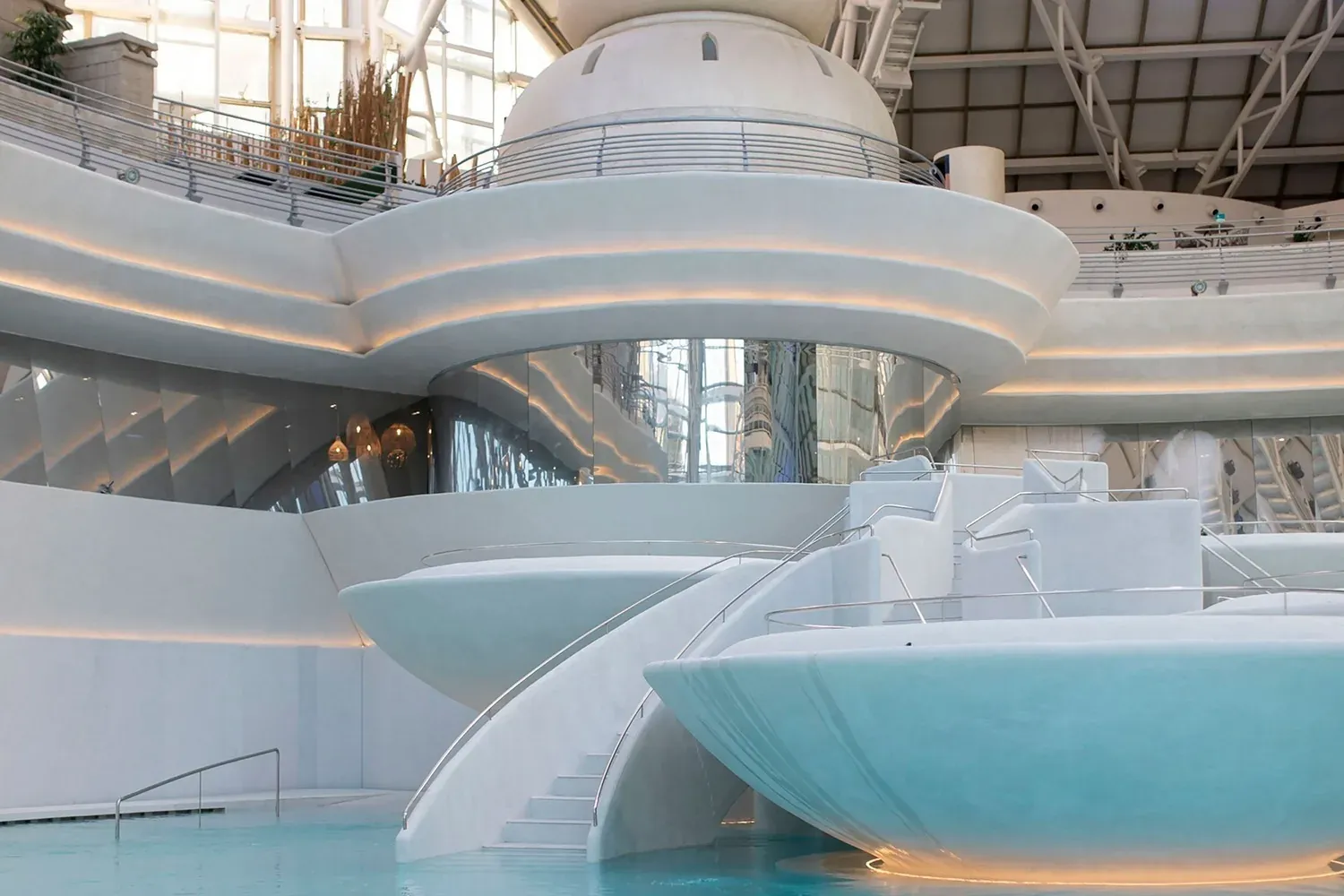 Futuristic NEXTA: Corporativa interior with pool and curved design.