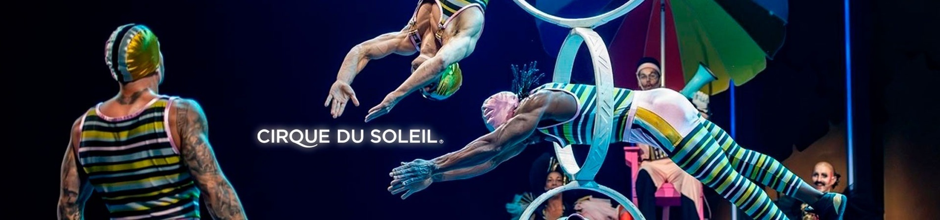 une affiche du cirque du soleil avec des acrobates sur scène