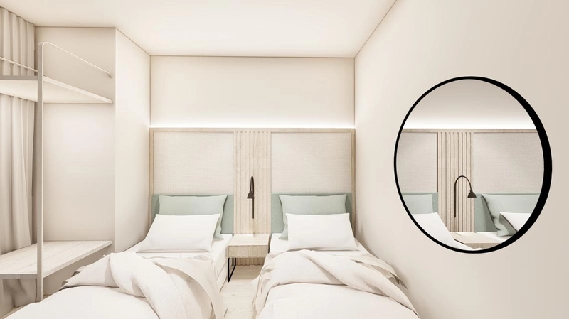 Chambre Gala Placidia avec deux lits simples, linge de lit blanc et miroir rond.