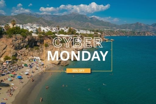 a man and a woman are sitting in lawn chairs on the beach drinking cocktails .