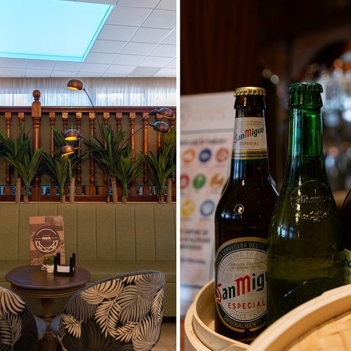 dos botellas de san miguel están en una bandeja de mimbre