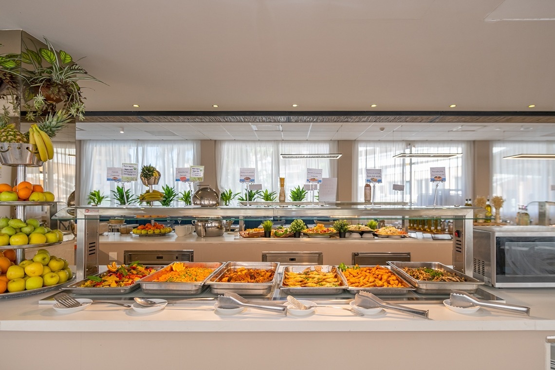a buffet with a sign that says ' healthy choices ' on it