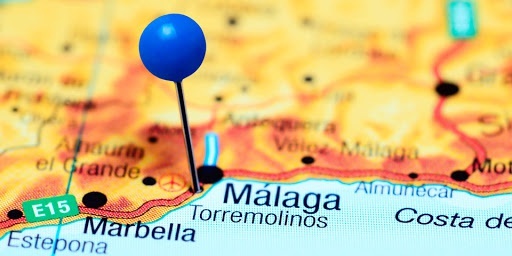 a blue pin is pinned to a map of malaga .