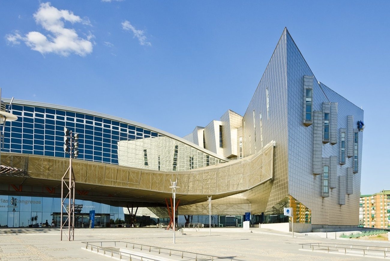 a large building with a blue sign that says ' a ' on it